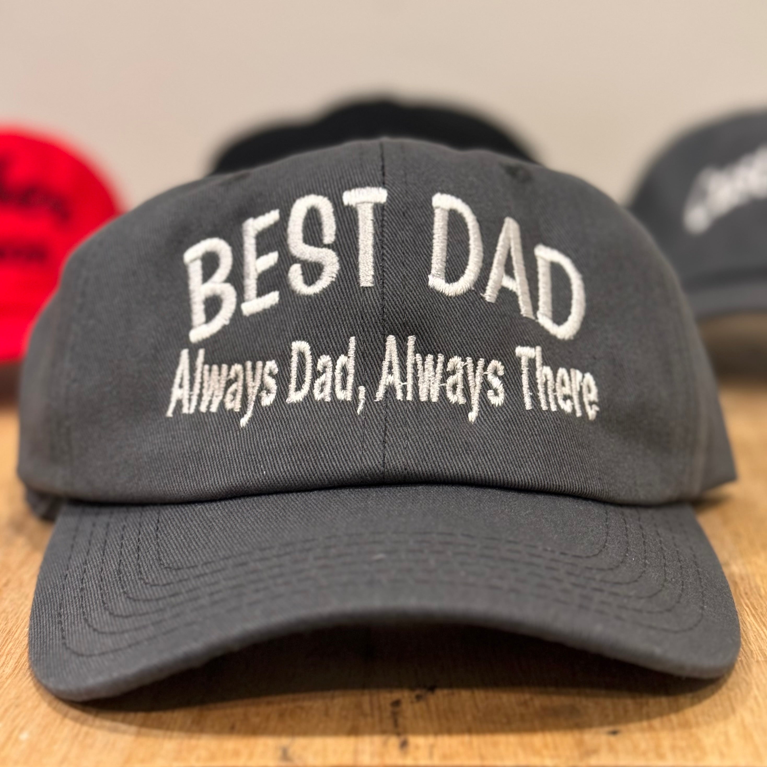 grey dad hat with best dad embroidered in the front. a fathers day gift